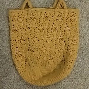 Bright yellow woven handbag
